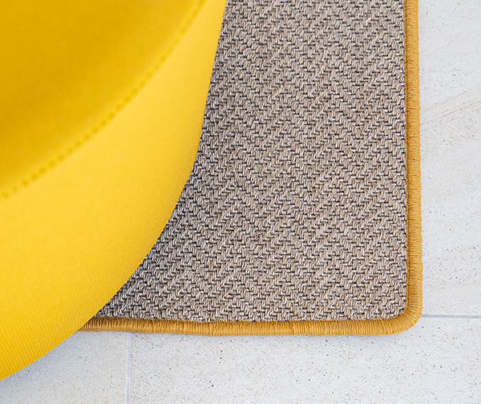 Coloca una alfombra de alta calidad en la entrada de la casa